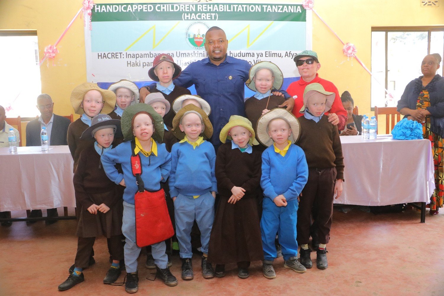 DED ARUSHA DC RECEIVING EDUCATION MATERIALS FROM HACRET